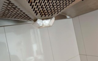 抽油烟机油杯怎么装回去