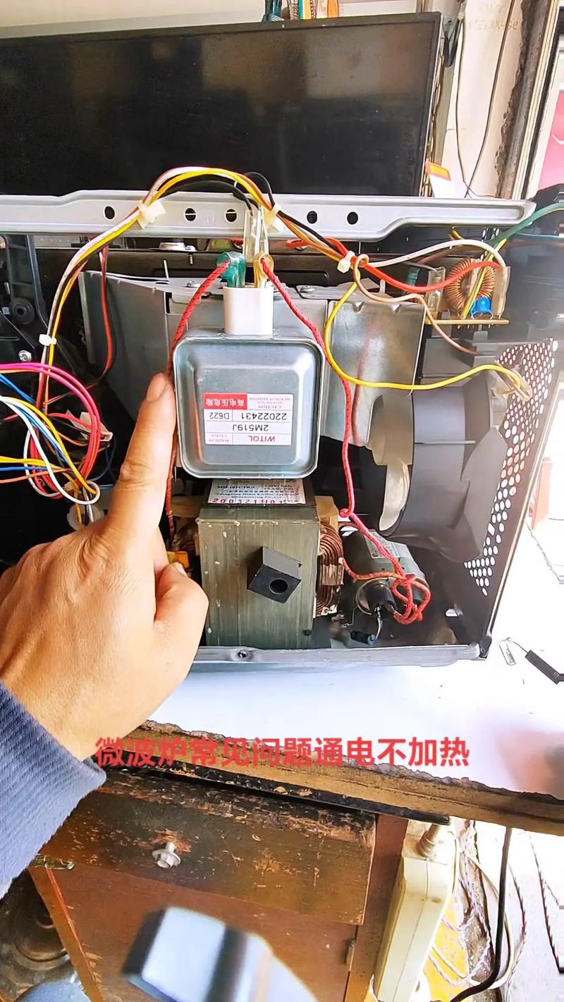lg微波炉灯不亮不加热怎么修视频-第1张图片-索能光电网