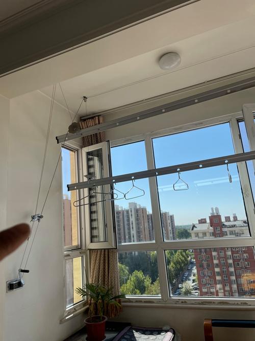 晾衣架卡住升降不动怎么办？-第1张图片-索能光电网