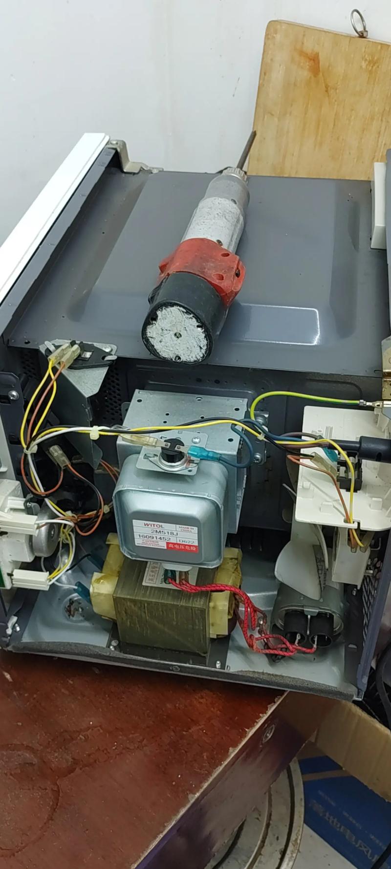 微波炉坏了，怎么找修理电话？-第1张图片-索能光电网